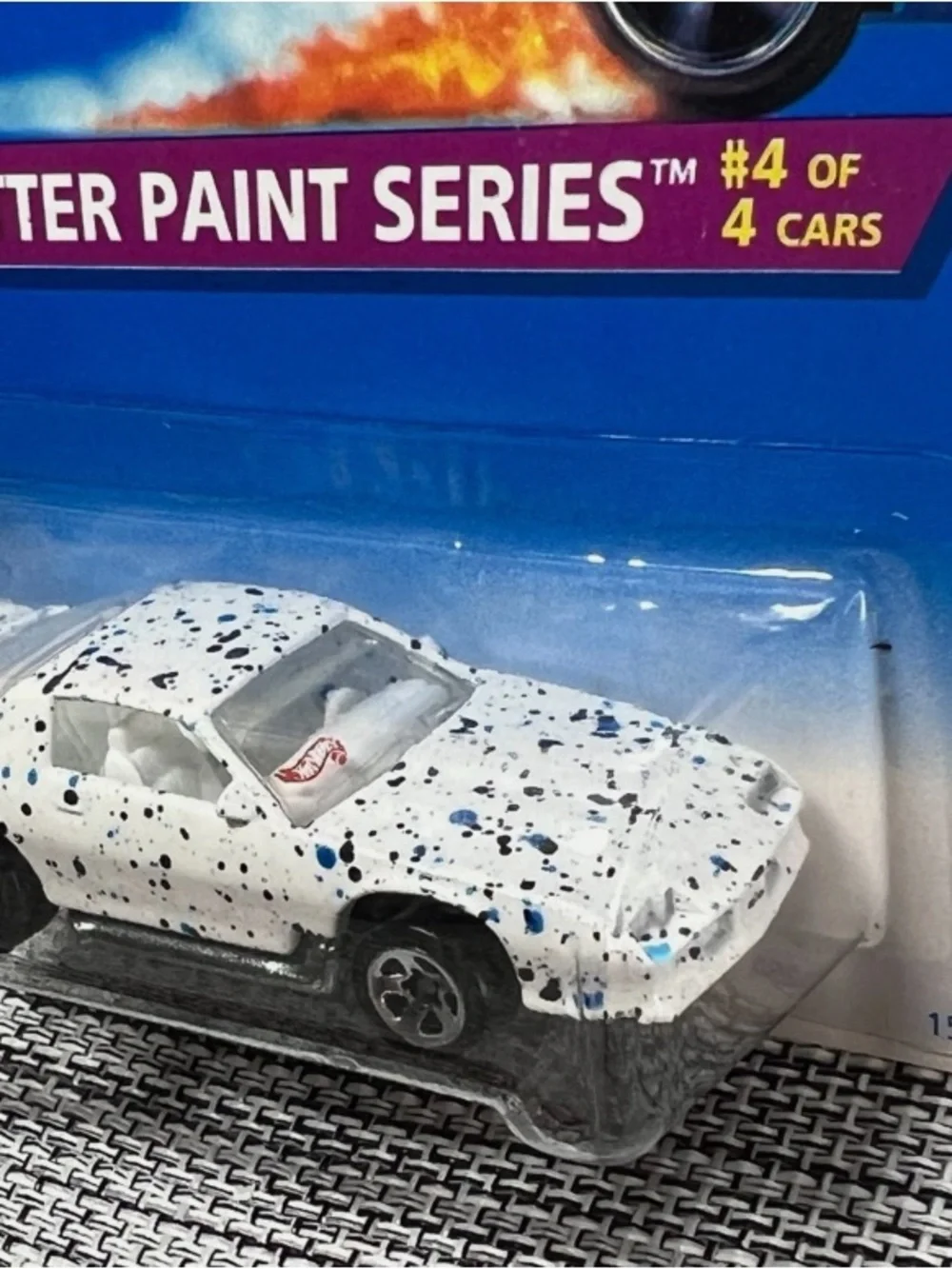 Mattel Splatter Paint Series White Toy Car with Blue and Black Accents